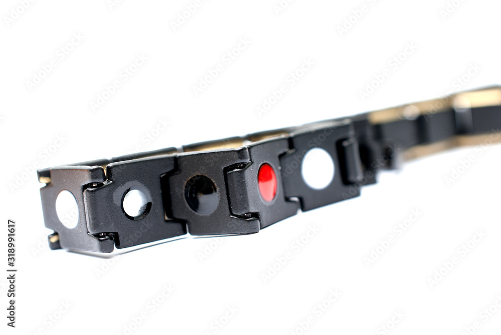 neodymium magnetic bracelet on white background, shallow dof neodymium magnetic bracelet on white background, shallow dof