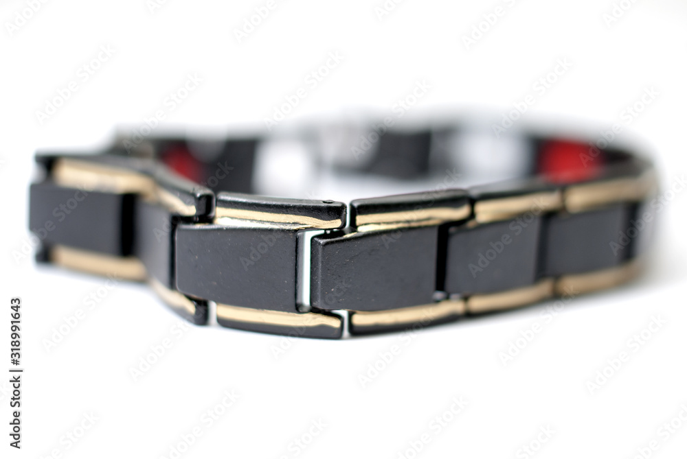 neodymium magnetic bracelet on white background, shallow dof neodymium magnetic bracelet on white background, shallow dof