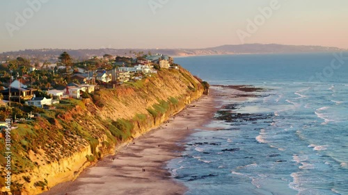 Aerial Drone video of the homes on the cliffs of beautiful Encinitas, California during sunset.  photo