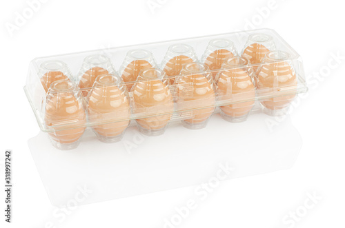 chicken eggs in a plastic container