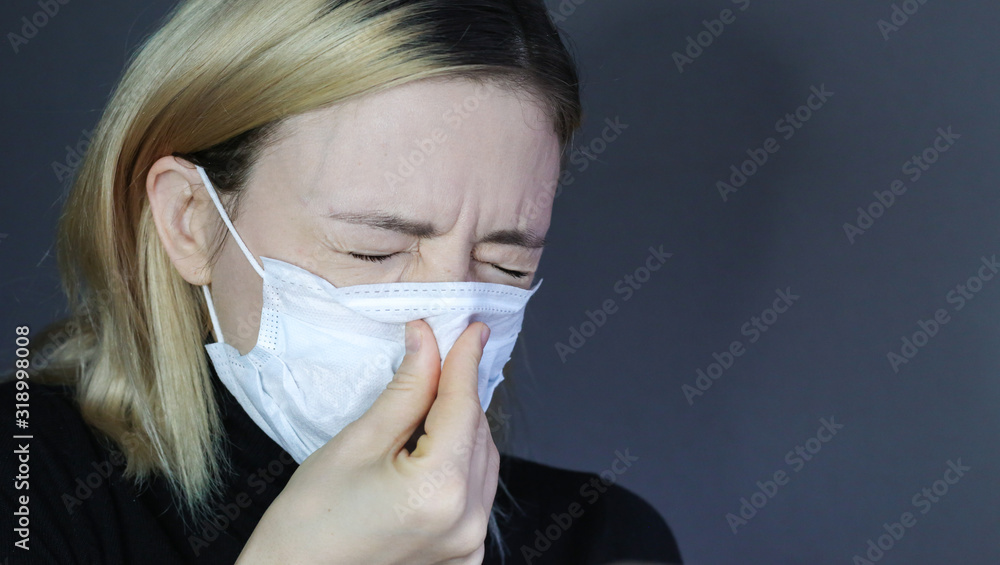 Sick woman wear a medical face mask against virus and protecting herself. Self protection. Sick woman wear a medical face mask against virus and protecting herself. Self protection.