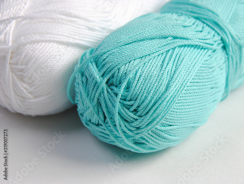 yarn for knitting in balls isolated on white background. color threads for embroidery