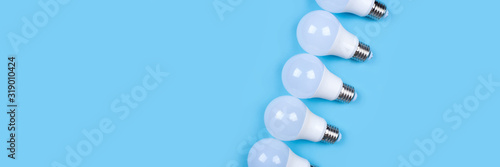 Several LED bulb on blue background. Saving energy concept.
