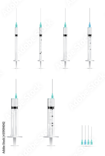 Realistic medical syringes and needles. Vector