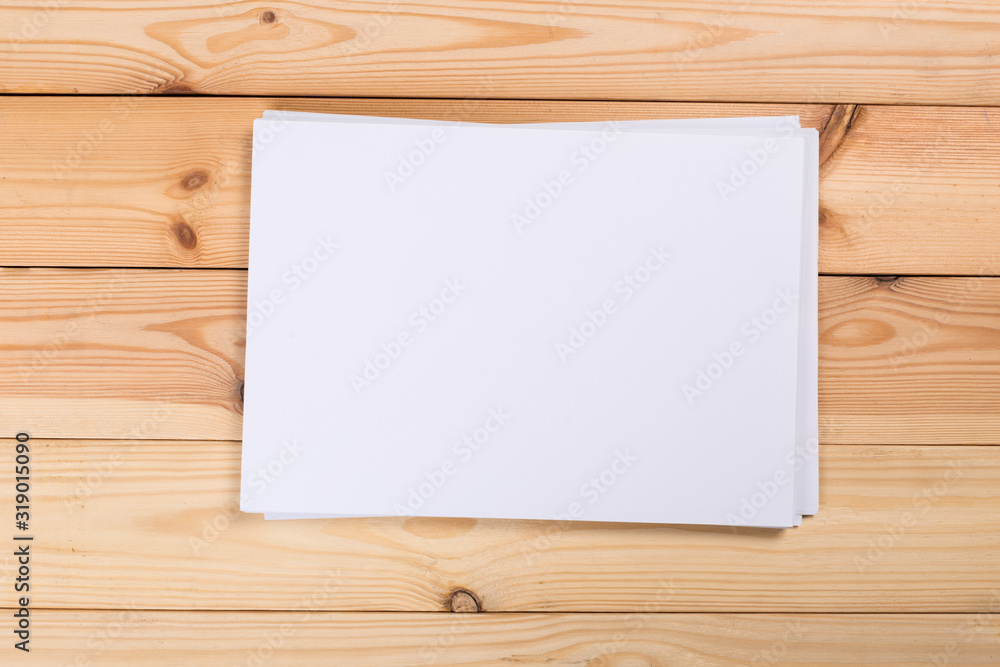 white paper on wood background and shadow white paper on wood background and shadow
