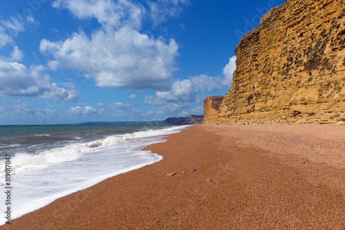 Jurassic coast Dorset UK at Freshwater beach with sandstone cliffs on walk towards West Bay