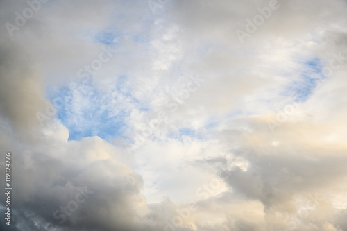 Dramatic afternoon blue sky with white and gray clouds as a nature background