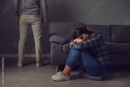 Фотография A woman is afraid of domestic violence
