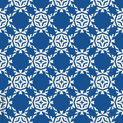 Vector ornamental seamless pattern. Floral geometric background, repeat tiles, diamonds, stars, flower shapes, grid, lattice. Abstract blue and white ornament texture. Modern oriental style design