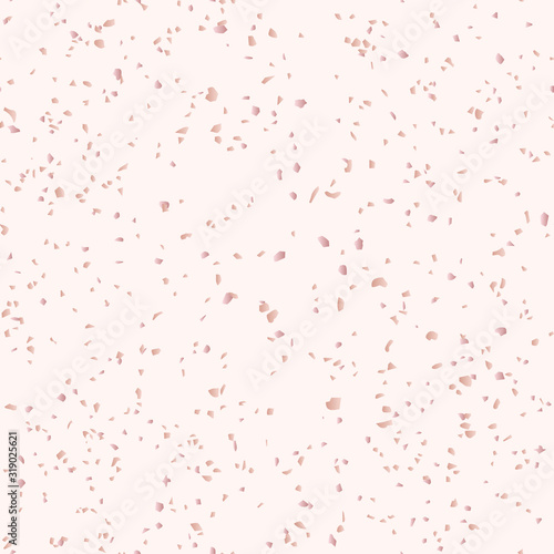 Vector rose gold terrazzo flooring texture. Seamless pattern with chaotic scattered golden pink confetti. Modern background. Luxury mosaic floor surface. Trendy design for decor, wallpaper, web, print
