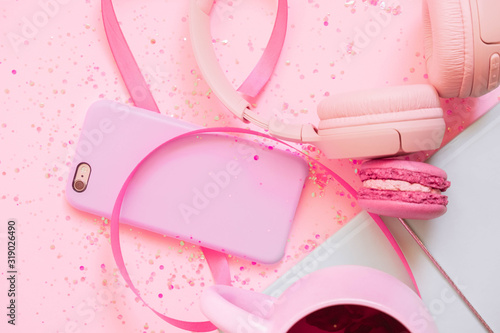 Slika na platnu Girl`s pretty pastel set with planner, tea, macaroon, phone and  headphones