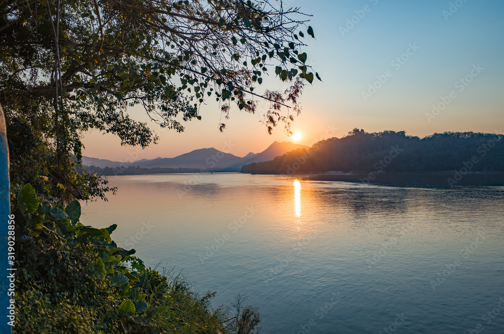 Beautiful sunset over lake in Luang prabang, Laos.
