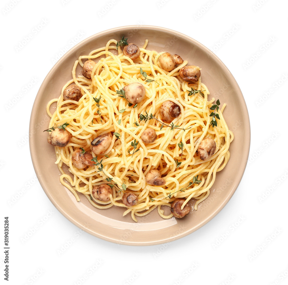 Plate with tasty pasta and mushrooms on white background
