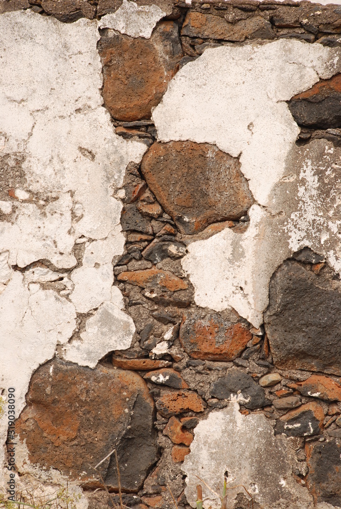 Fototapeta premium old ruined white wall with bricks