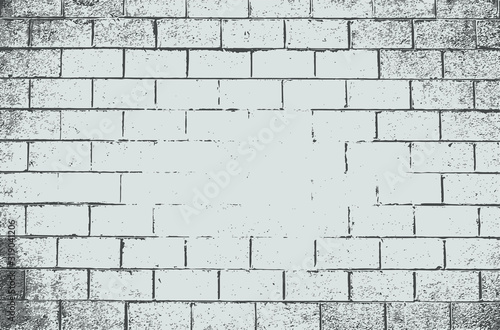 White gray brick cinder block wall background. Neutral grunge texture of a flat cement wall close-up.