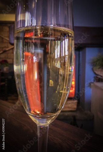 Glass of champagne on the table