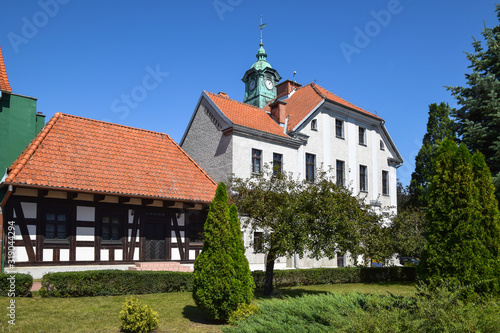 Fototapeta Naklejka Na Ścianę i Meble -  Kajki Square (former market square) and town hall from 1825 in Mragowo, Masuria, Poland