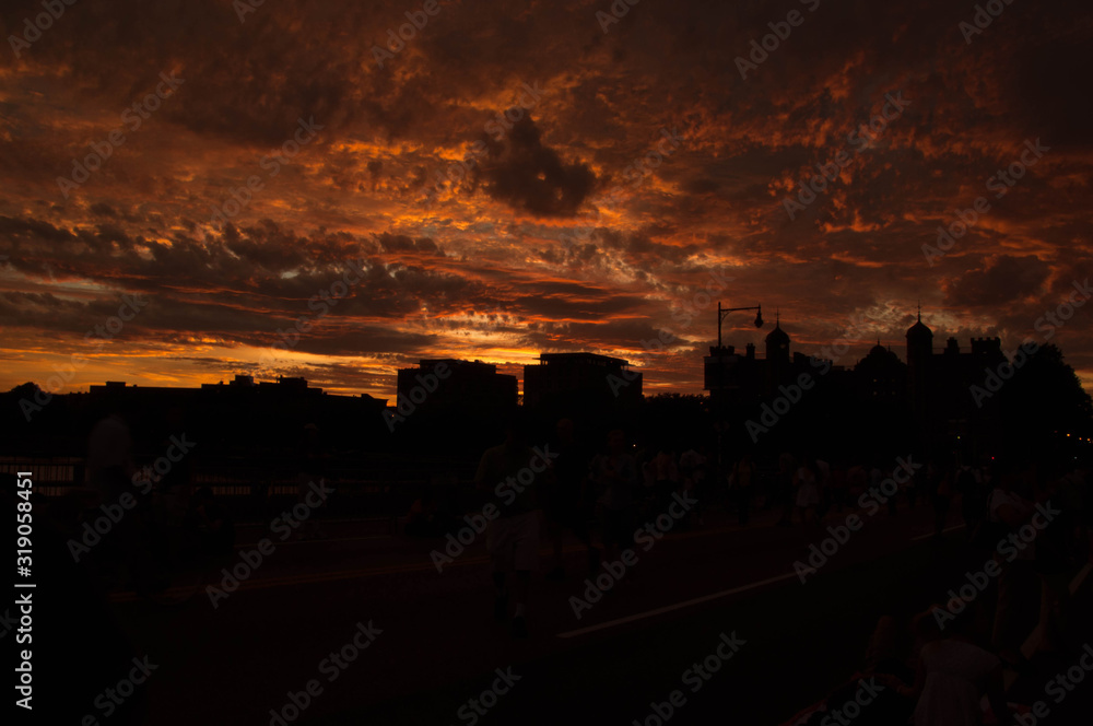 orange sky right before July 4th firework on charles river