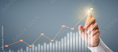 Businessman plan graph growth and increase of chart positive indicators
