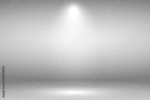 White stage with spot lighting in gray background.