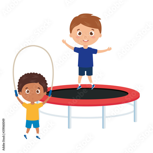 cute little boys with trampoline jump and rope jump