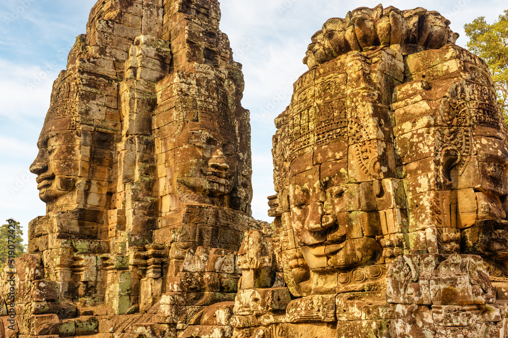 Wonderful view of towers with stone faces of Bayon temple