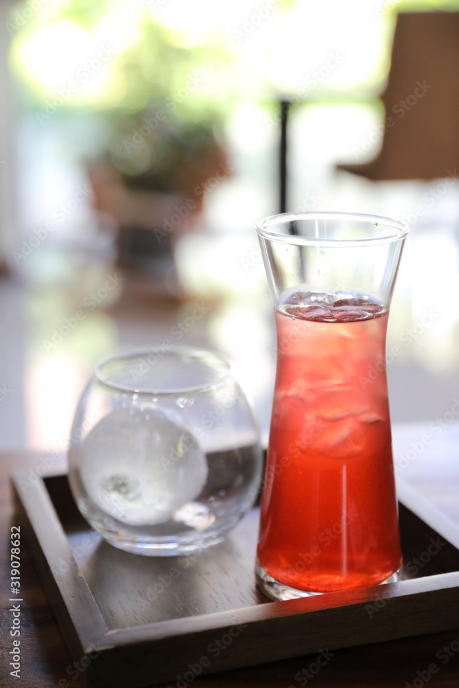 Strawberry iced tea on wood background Strawberry iced tea on wood background