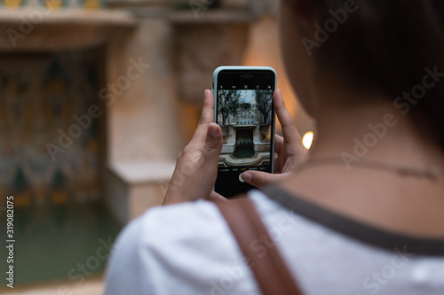 young girl take a photo