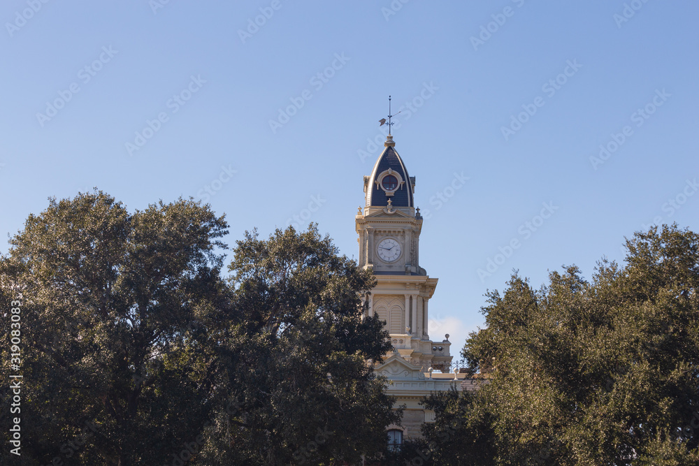 Clock tower atop the county courthouse in historic Goliad, Texas (built in 1894) Clock tower atop the county courthouse in historic Goliad, Texas (built in 1894)