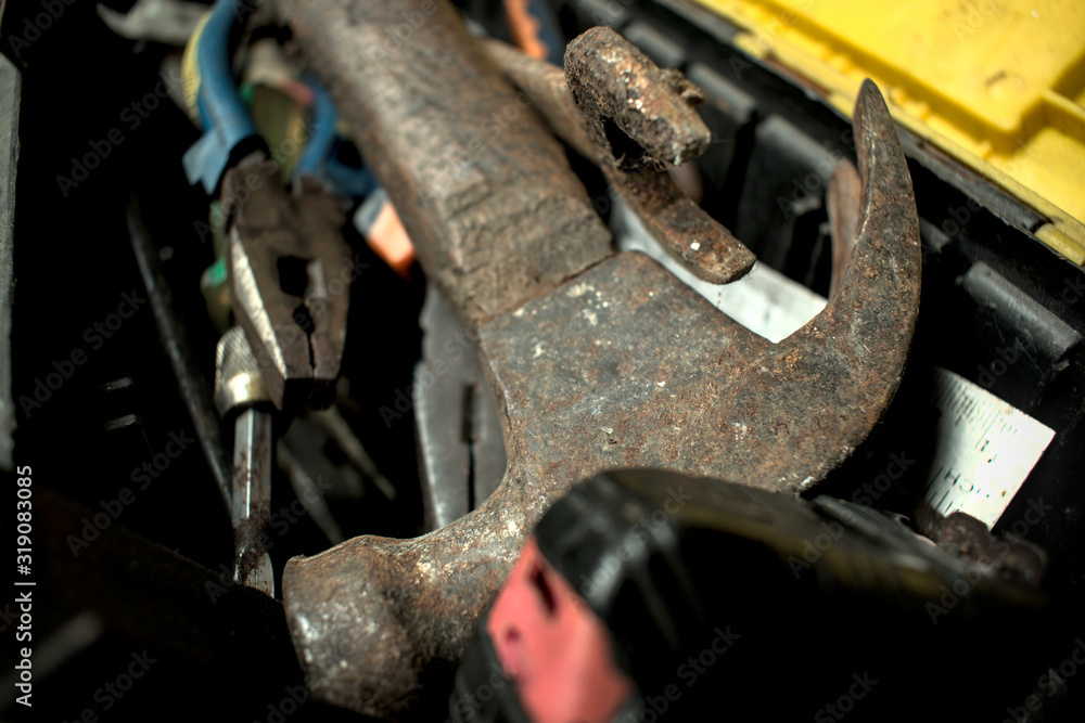 Rusty Old Used Tools inside a toolbox close up shot Rusty Old Used Tools inside a toolbox close up shot