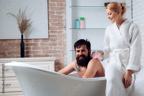 Body care. Bathing beauty spa family. Relaxing time. Family morning. Couple in love grooming in morning. Morning hygiene. Everyday life. Young adult body care morning routine.