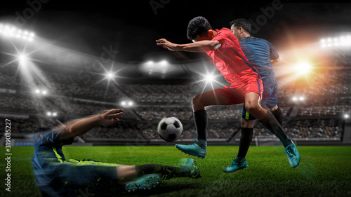 Fototapeta Naklejka Na Ścianę i Meble -  Soccer player kicks the ball on the soccer field.Professional soccer player in action.