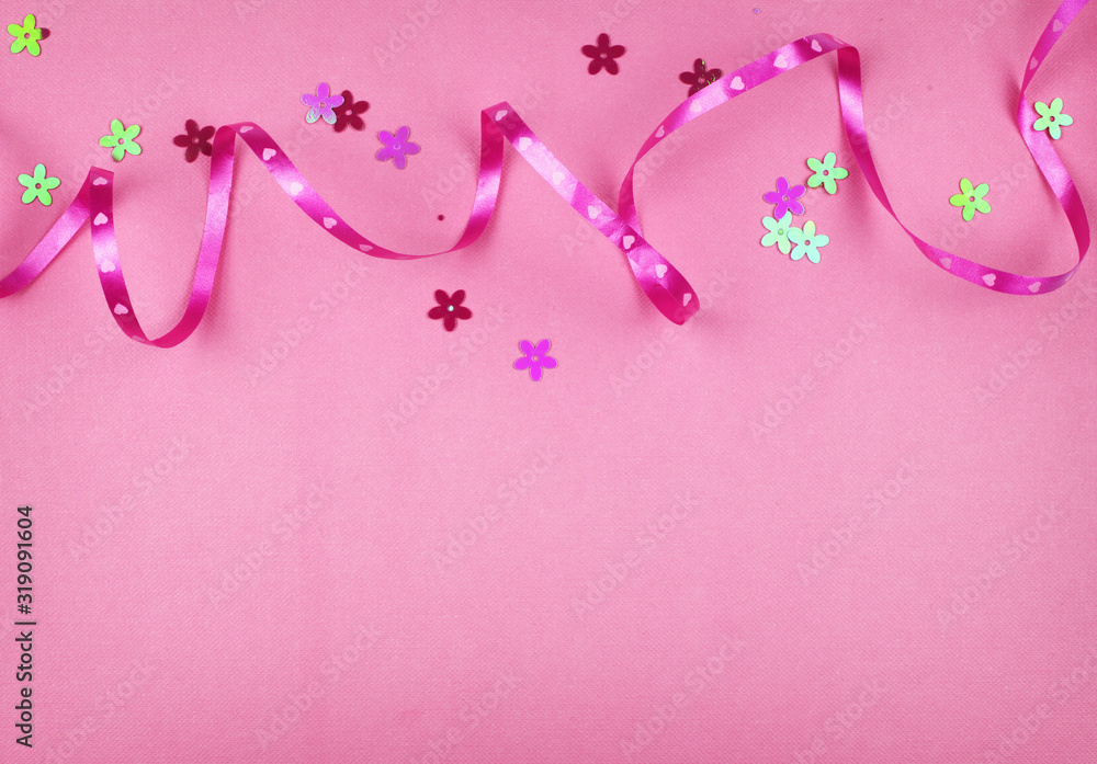 Wrapping ribbon and sequins flowers on pink paper Wrapping ribbon and sequins flowers on pink paper