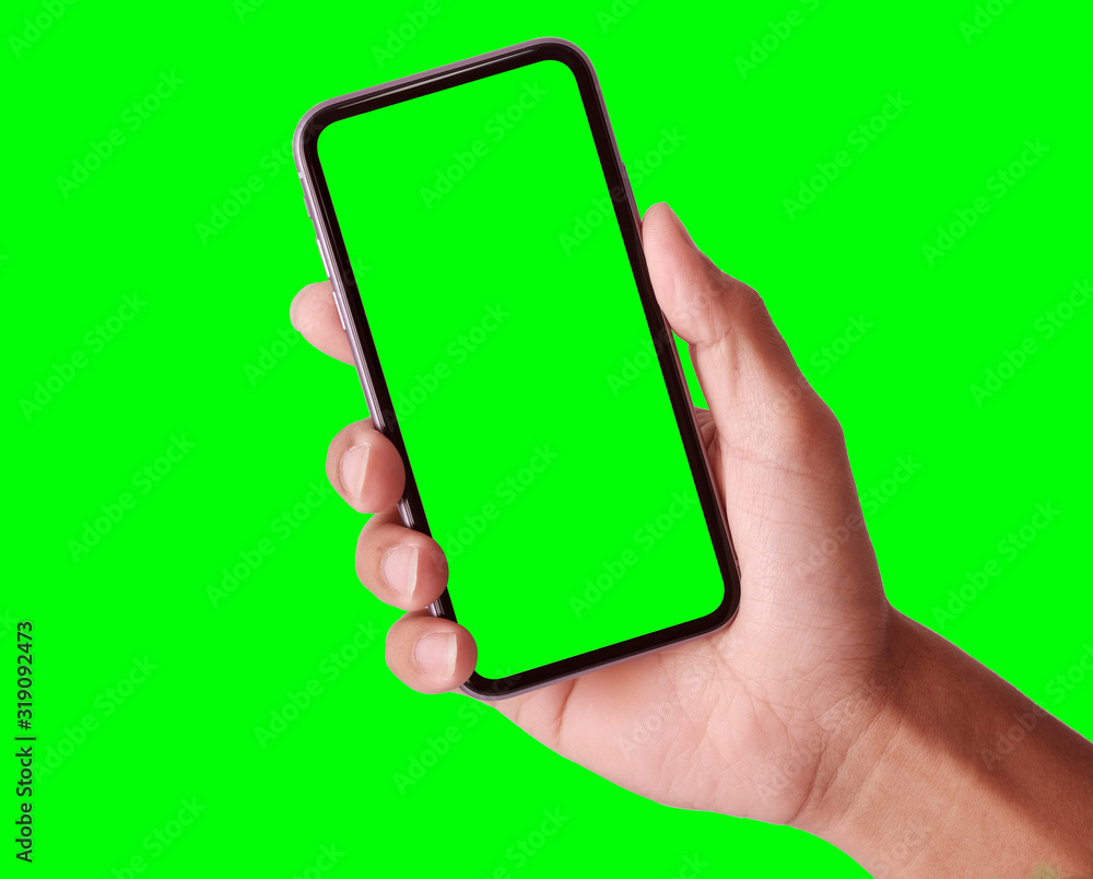 Foto Stock Studio shot of hand shows mobile smartphone with green screen in  vertical position isolated on background. Mock up mobile for Infographic  Global Business web site design app, - Clipping Path