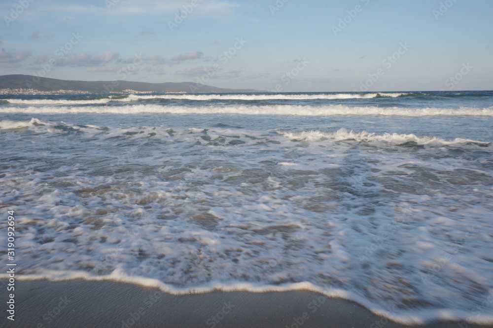 Daylight, summer day, light breeze on the seashore, incident waves on the shore. Daylight, summer day, light breeze on the seashore, incident waves on the shore.