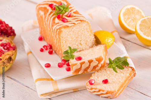 Lemon sponge cake with pomegranate.