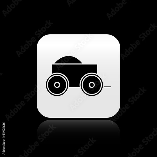 Black Wooden four-wheel cart with hay icon isolated on black background. Silver square button. Vector Illustration