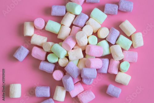 mini marshmallow on pink background