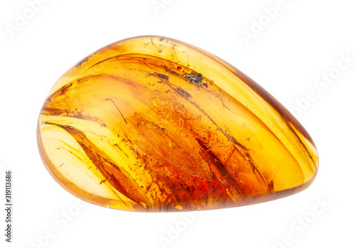 Fotobehang polished Amber gem with inclusions isolated