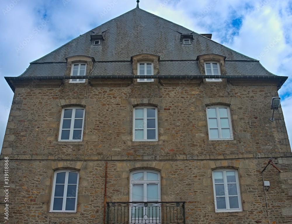 Naklejka premium Traditional french stone building with many windows