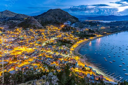 Obraz na płótnie Bolivia, La Paz Department. Copacabana, main town at the shore of Lake Titicaca. Night view of the town from Cerro Calvario. There is the Basilica of Our Lady of Copacabana w salonie