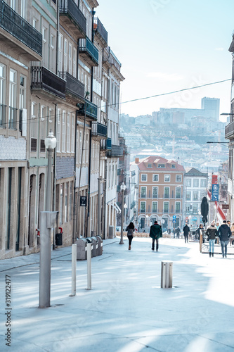 Porto, Portugal - Pedestrian street plaza in the morning sunshine in winter