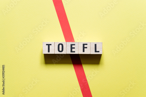 Toefl word concept on cubes photo