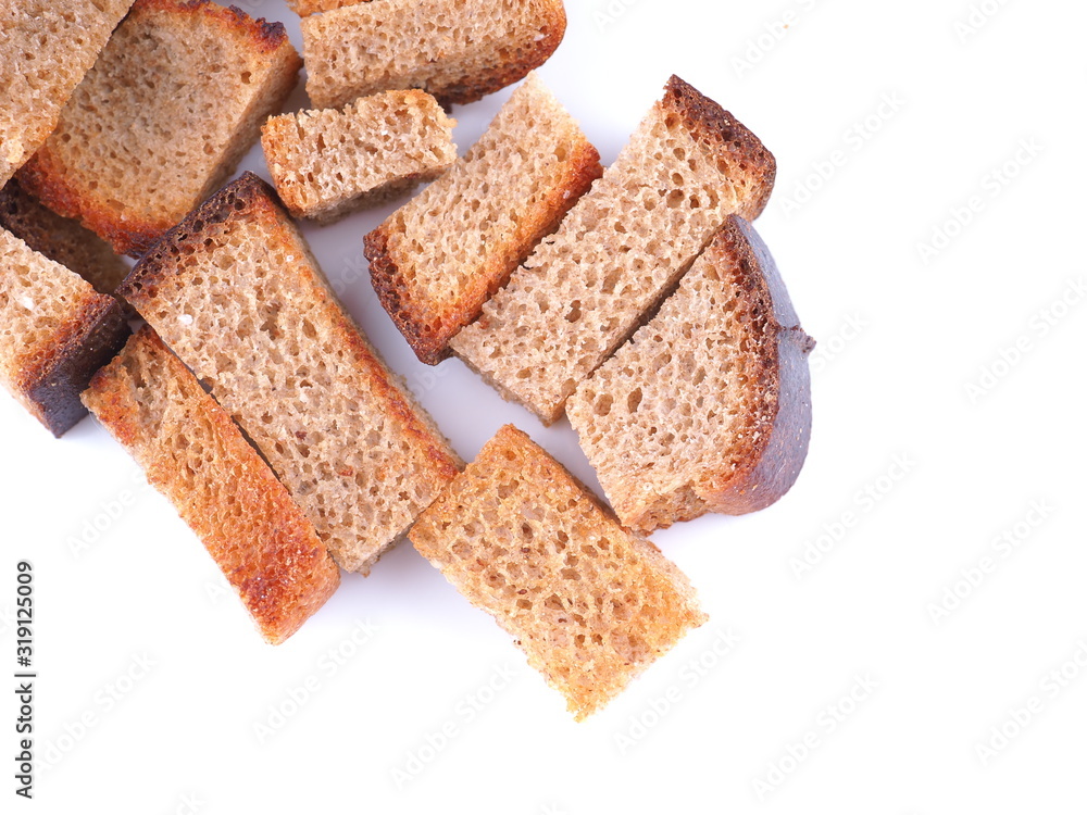 pieces of dried bread on a white background pieces of dried bread on a white background