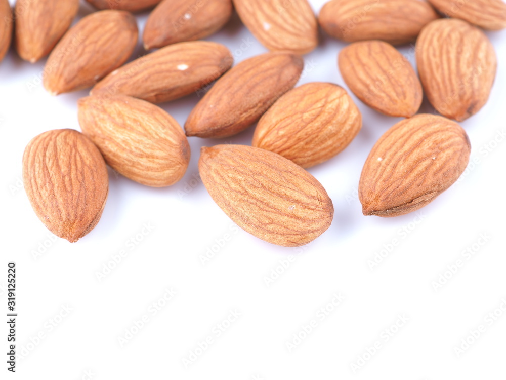 almonds on a white background almonds on a white background