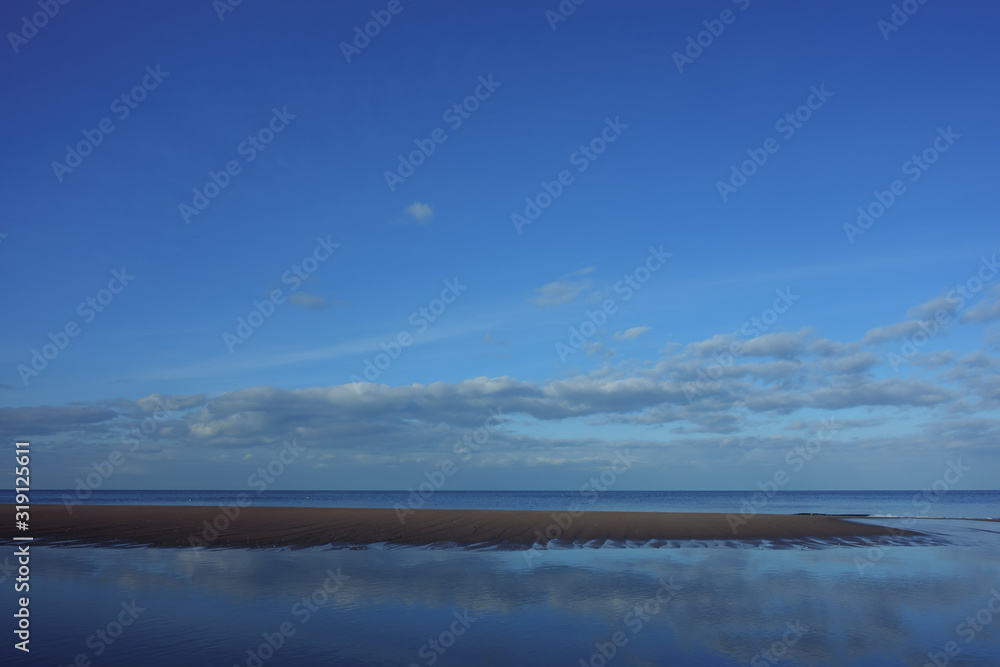 Sea scape with a blue sky