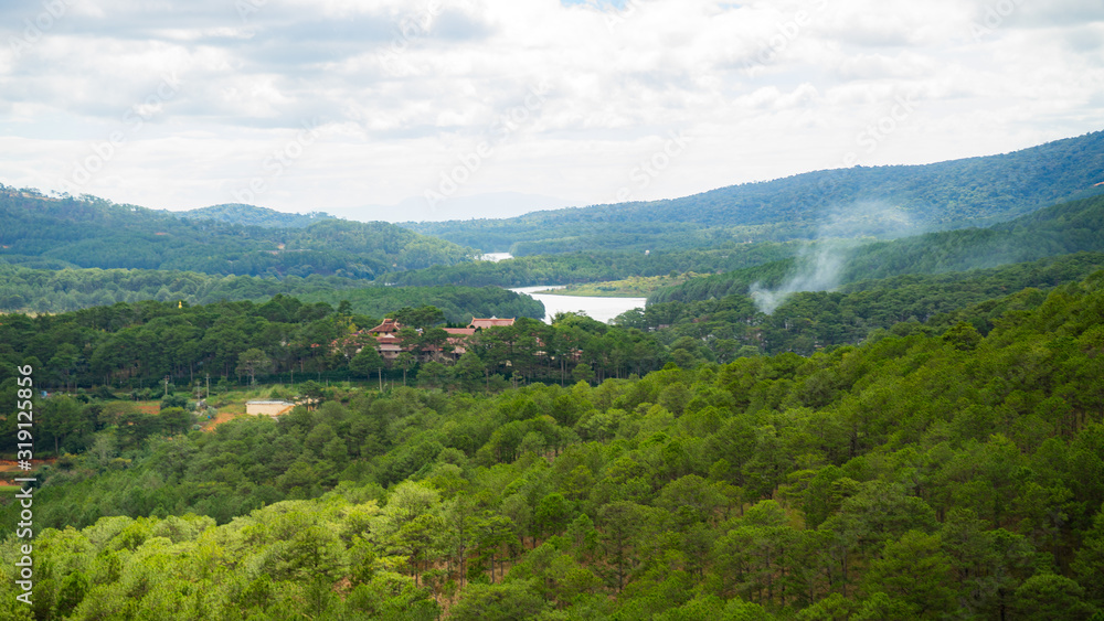 Mountain landscapes covered with forests up to the horizon in the city of Dalat in Vietnam. Mountain landscapes covered with forests up to the horizon in the city of Dalat in Vietnam.