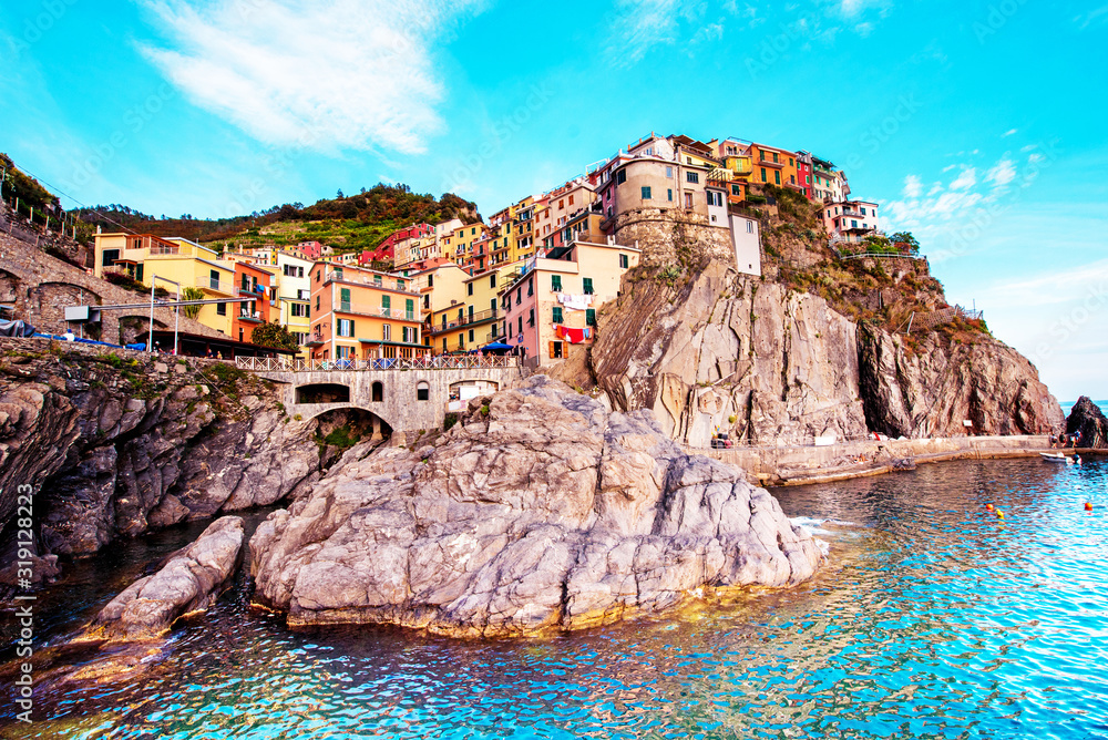 Beautiful magic colorful summer landscape on the coast of Manarola in Cinque Terre, Liguria, Italy. Exotic amazing places. Popular tourist atraction.