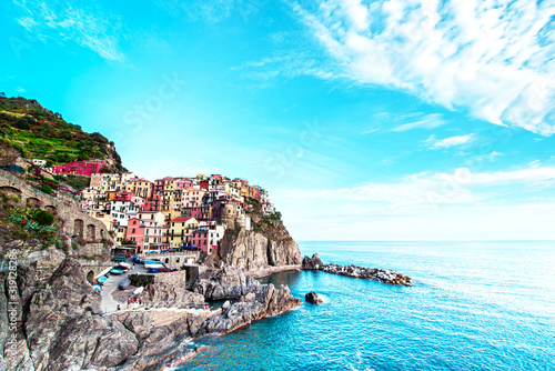Obraz na płótnie Beautiful magic colorful summer landscape on the coast of Manarola in Cinque Terre, Liguria, Italy. Exotic amazing places. Popular tourist atraction. w salonie