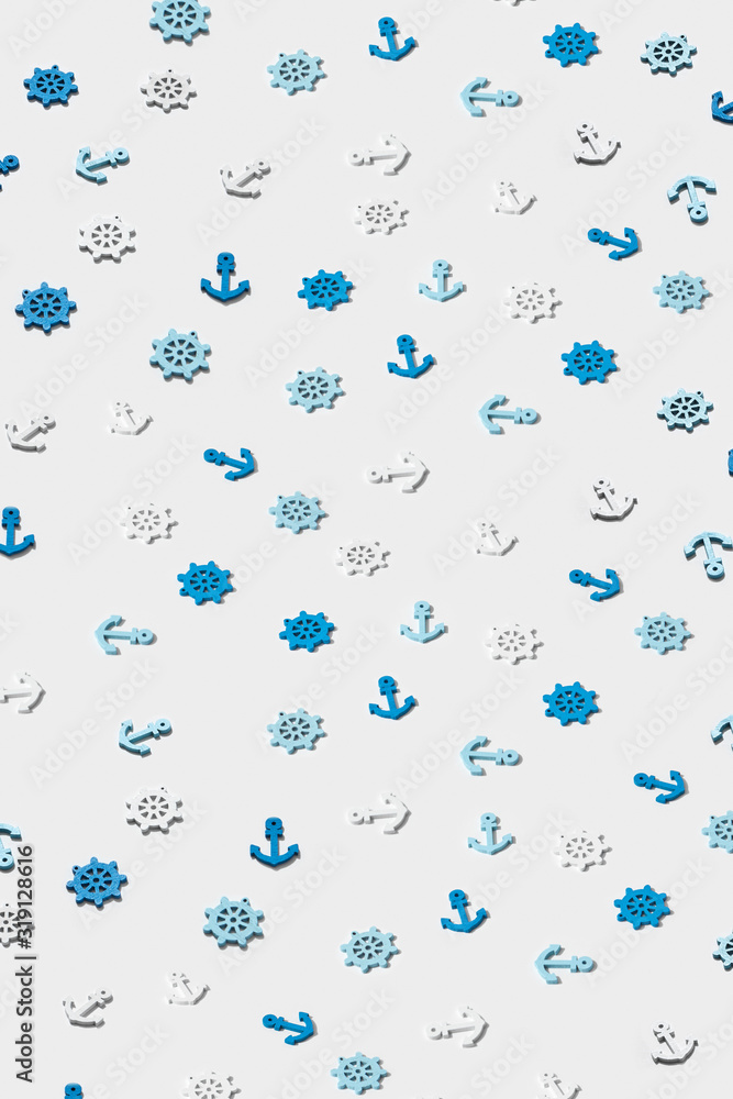 Vertical marine background with anchors and wheels. Vertical marine background with anchors and wheels.